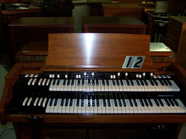 This is a Hammond C3 organ with two Leslie Speakers!