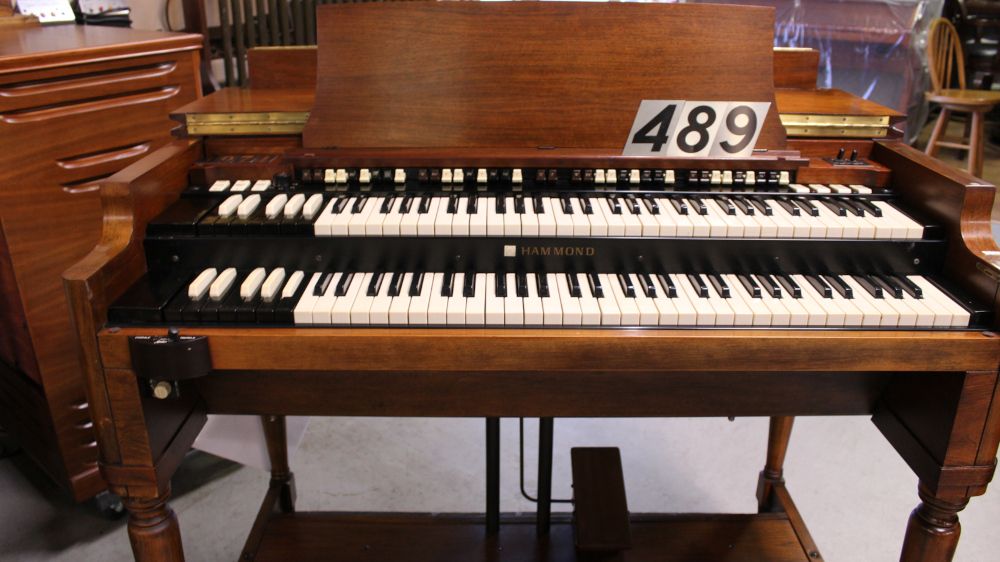 489 is a 1974 Hammond B3 in a Walnut finish.  Serial #D-216734