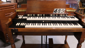 489 is a 1974 Hammond B3 in a Walnut finish.  Serial #D-216734
