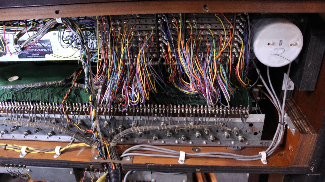 643 is a 1963 Hammond A-100 in a mahogany finish for sale!