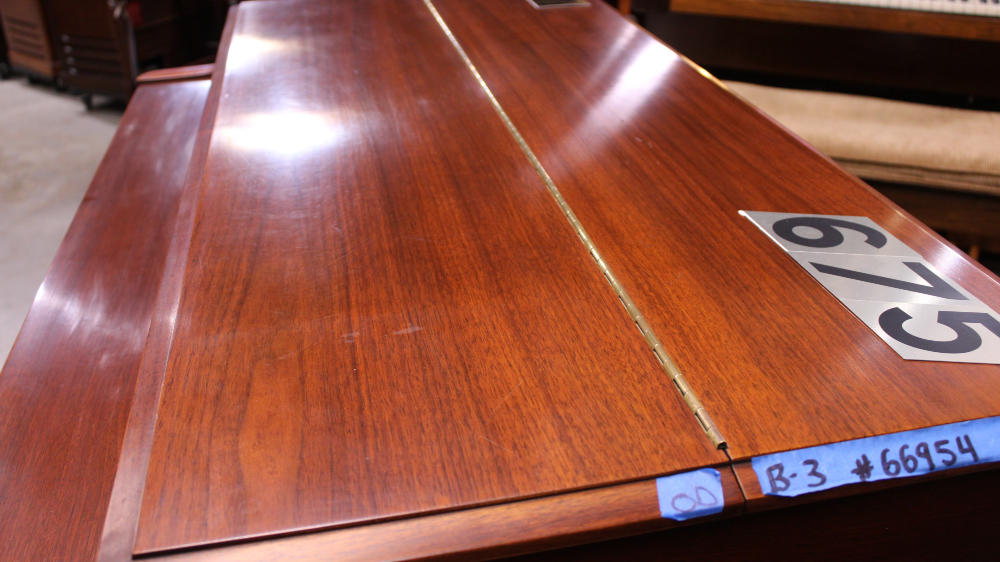 675 is a 1957 Hammond B-3 in a walnut finish, Serial 66954, for sale now. A rare golden-era instrument that represents the finest craftsmanship of Hammond's history.