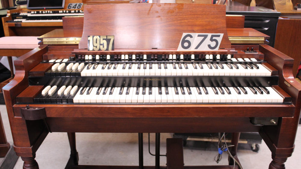 675 is a 1957 Hammond B-3 in a walnut finish, Serial 66954, for sale now. A rare golden-era instrument that represents the finest craftsmanship of Hammond's history.
