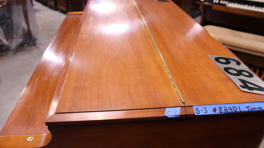 684 is a 1960 Hammond B-3 in a fruitwood finish, Serial 82401, for sale now. A reliable, golden-era organ that delivers the legendary Hammond tone in a beautiful and practical package.