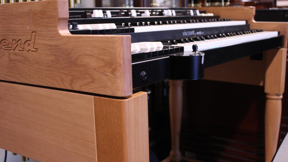 Legend F-1 organ in blonde finish, #688, for sale with Leslie 3300. Complete package includes stand, pedalboard, and bench. Classic tone with modern convenience, worldwide shipping from KEI.