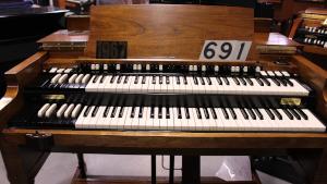 691 is a 1967 Hammond B3 in a walnut finish for sale!
