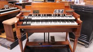 694 is a 1959 Hammond B3 in a walnut finish for sale!