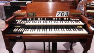 703 is a 1962 Hammond B3 in a walnut finish for sale!