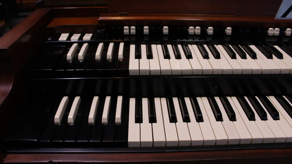 Angled view of keyboards and preset keys on Hammond B3 #726 in walnut finish